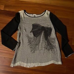 Lara Rosnovsky viscose top with knit sleeves.